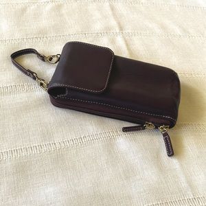 Levenger dark purple phone/wallet crossbody. I think it looks more dark brown